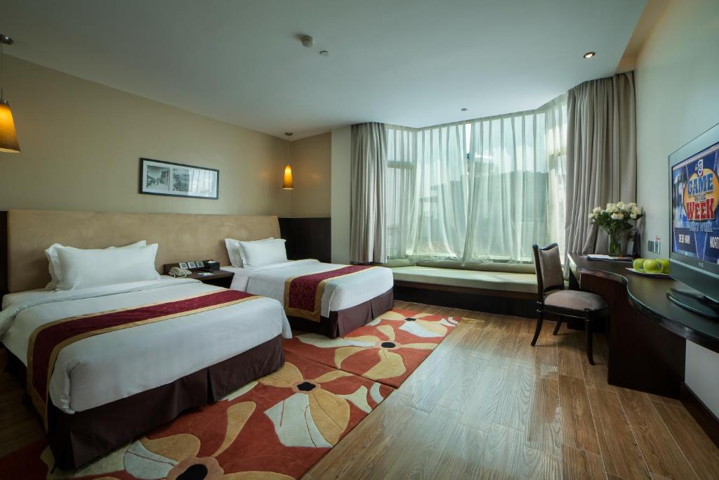 Двухместный (Улучшенный двухместный номер с 2 отдельными кроватями и видом на город) отеля The Hanoi Club Hotel & Lake Palais Residences, Ханой