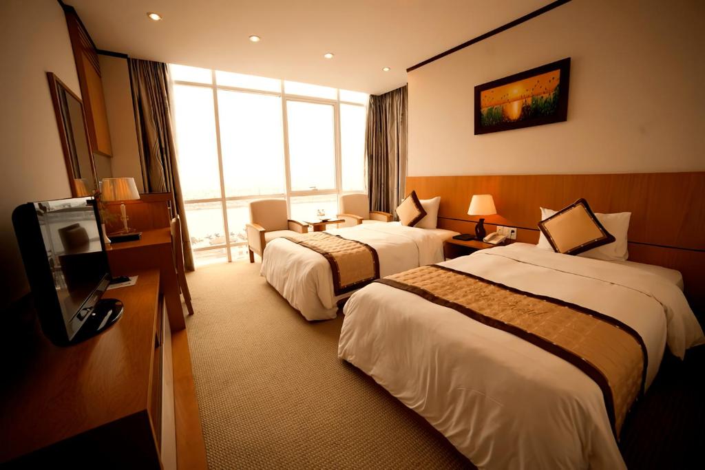 Двухместный (Улучшенный двухместный номер с 1 кроватью или 2 отдельными кроватями) отеля Da Nang Petro Hotel, Дананг
