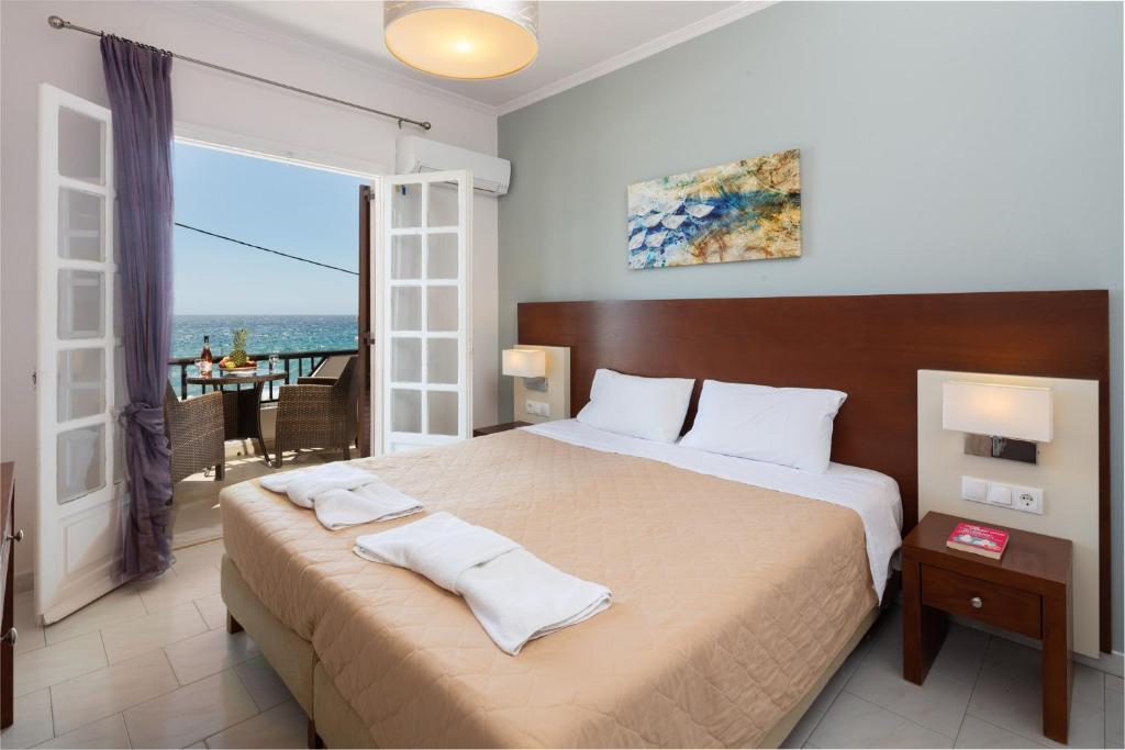 Двухместный (Двухместный номер с 1 кроватью или 2 отдельными кроватями и видом на море) гостевого дома Dandidis Seaside Pension, Агиос-Гордиос