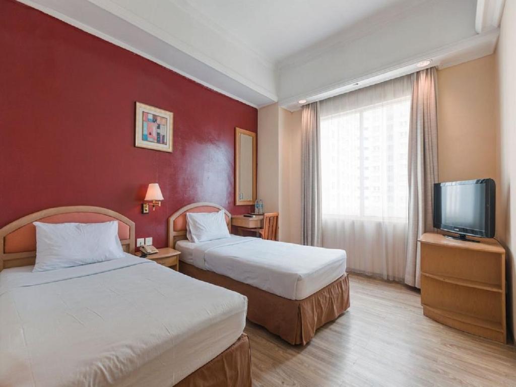 Двухместный (Стандартный двухместный номер с 2 отдельными кроватями) отеля OYO 784 Hotel Bulevar, Джакарта