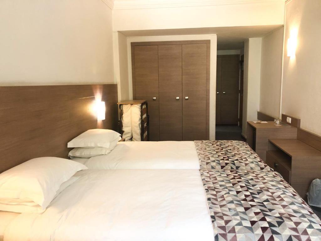 Двухместный (Двухместный номер с 1 кроватью или 2 отдельными кроватями и дополнительной кроватью) отеля Hotel Flamingo, Лиссабон