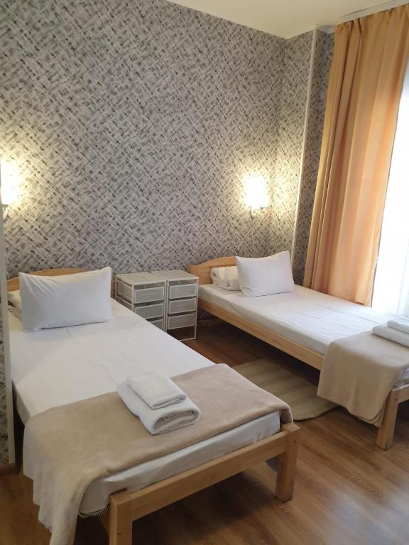 Двухместный (Бюджетный двухместный номер с 2 отдельными кроватями) отеля Alta Hostel, Рига