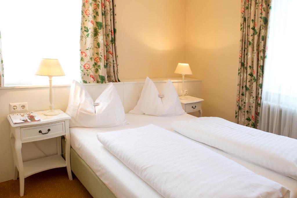 Двухместный (Стандартный двухместный номер с 1 кроватью или 2 отдельными кроватями) отеля Romantik Hotel Post, Филлах