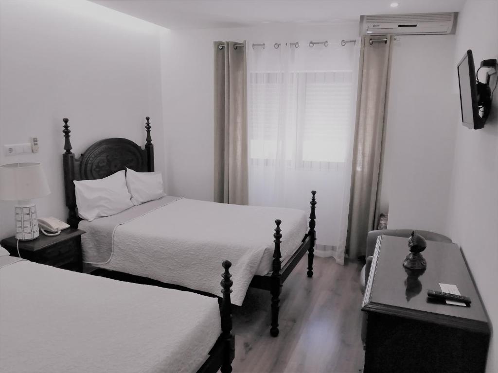 Двухместный (Двухместный номер с 2 отдельными кроватями) отеля Hotel Domus, Коимбра