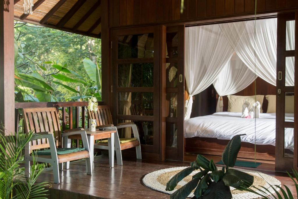 Номер (Коттедж с видом на сад) парк-отеля Exclusive Bali Bungalows, Улувату