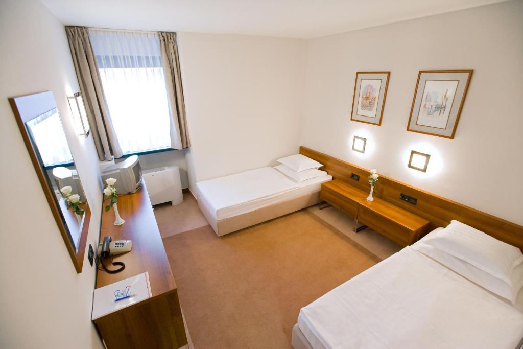 Двухместный (Двухместный номер с 2 отдельными кроватями) отеля Hotel Laguna Zagreb, Загреб