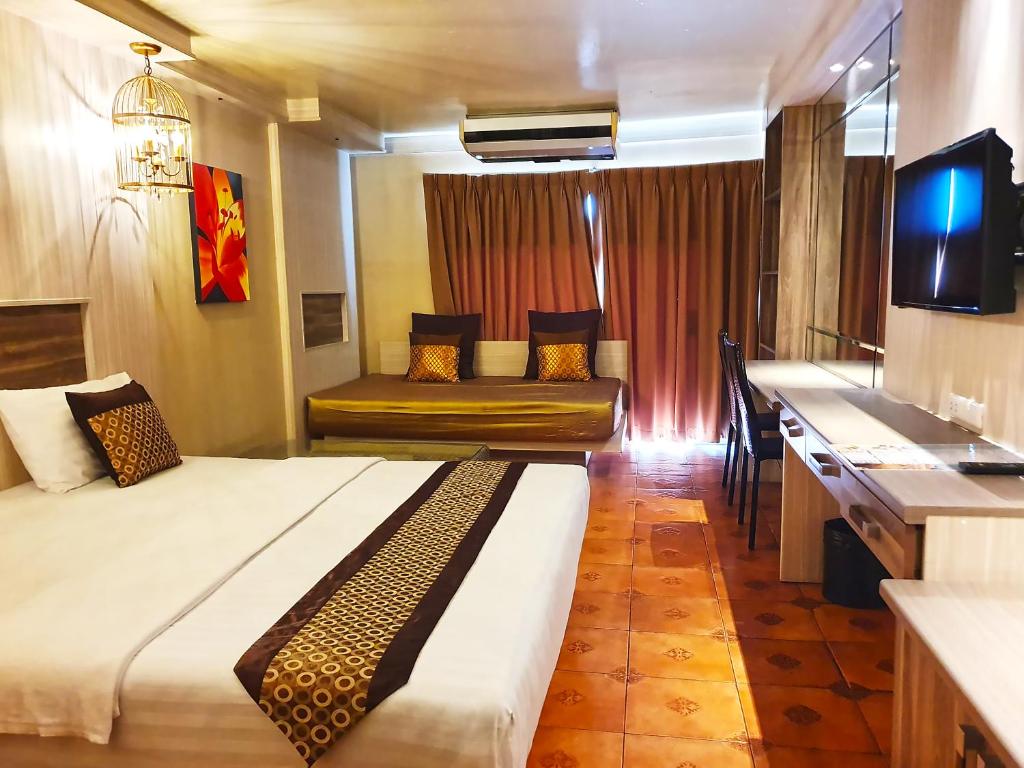 Двухместный (Двухместный номер Делюкс с 1 кроватью) отеля The Montana Lodge-Sathorn, Бангкок