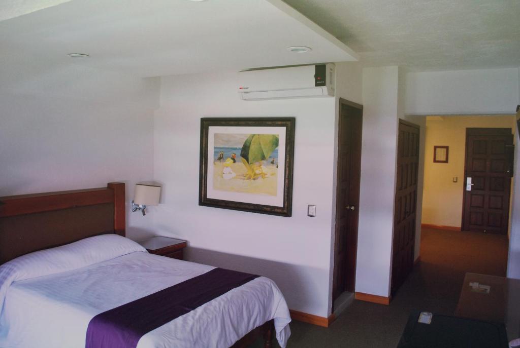 Двухместный (Двухместный номер с 2 отдельными кроватями) отеля Hotel Campestre Inn, Леон (Штат Гуанахуато)