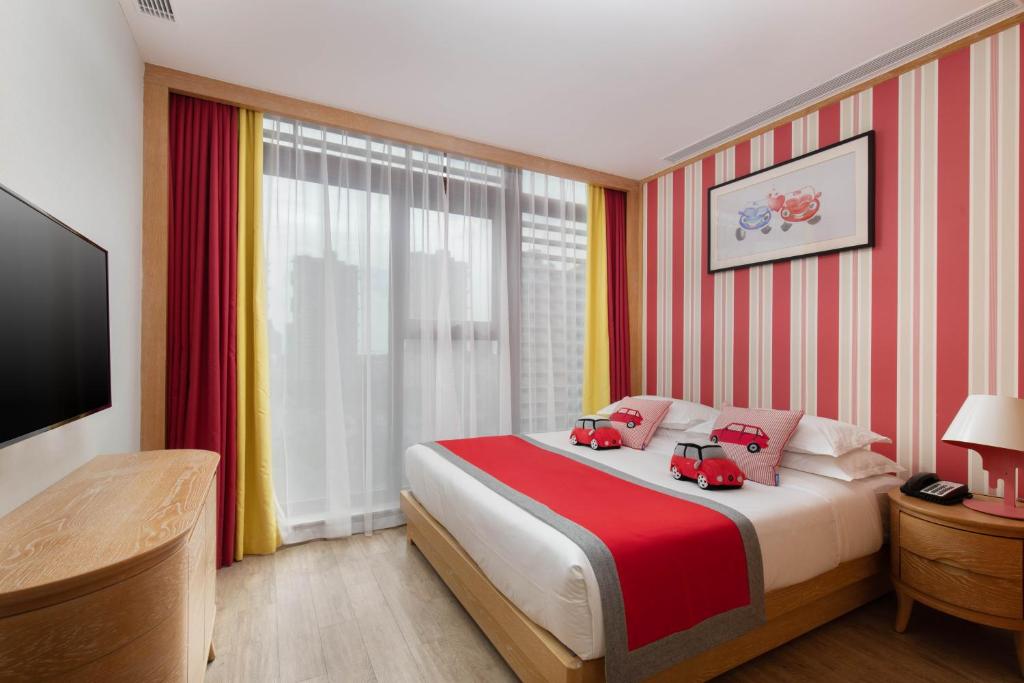 Сьюит (The Racer Two-bedroom Suite) отеля Mangrove Tree Resort World Sanya Bay -Elader Palm Tower, Санья