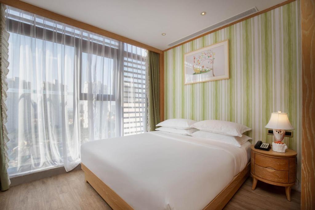 Сьюит (Palm Fairy Little Princess Two-bedroom Suite) отеля Mangrove Tree Resort World Sanya Bay -Elader Palm Tower, Санья