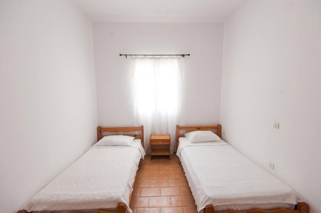 Двухместный (Бюджетный двухместный номер с 2 отдельными кроватями) отеля Madalenas B&B, Пелекас