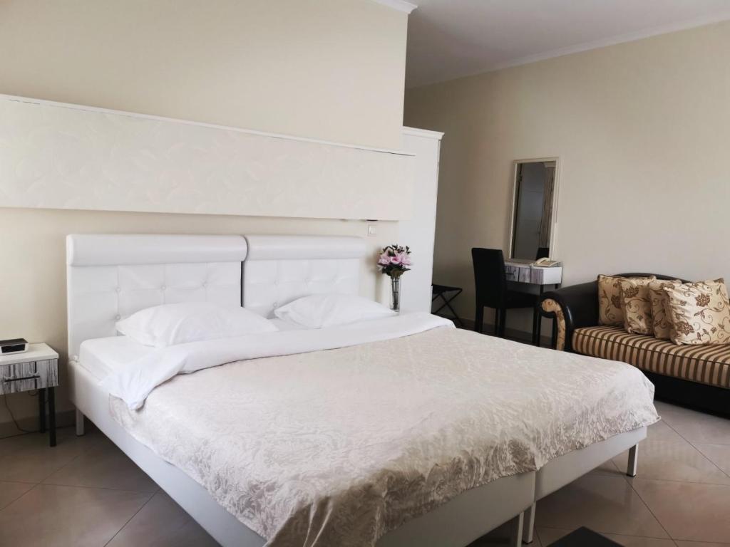 Двухместный (Двухместный номер с 1 кроватью или 2 отдельными кроватями) отеля Garni Hotel Dash, Нови-Сад
