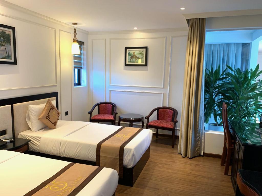 Двухместный (Двухместный номер Делюкс с 2 отдельными кроватями) отеля Khanh Linh Hotel, Дананг