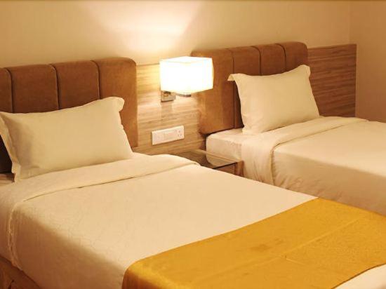 Двухместный (Улучшенный двухместный номер с 2 отдельными кроватями) отеля NU Hotel @ KL Sentral, Куала-Лумпур