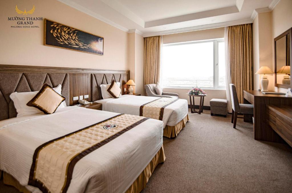 Двухместный (Двухместный номер Делюкс с 2 отдельными кроватями) отеля Muong Thanh Grand Phuong Dong, Винь