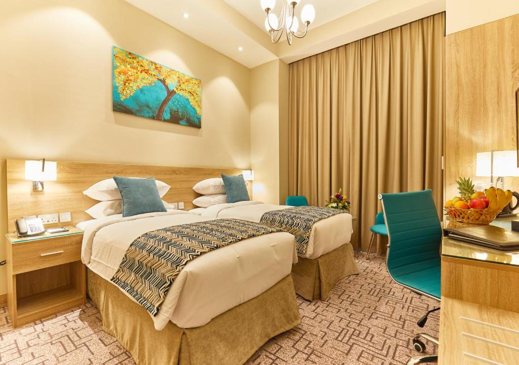 Двухместный (Классический двухместный номер с 2 отдельными кроватями — Поздняя регистрация отъезда до 14:00) отеля Rose Plaza Hotel Al Barsha, Дубай