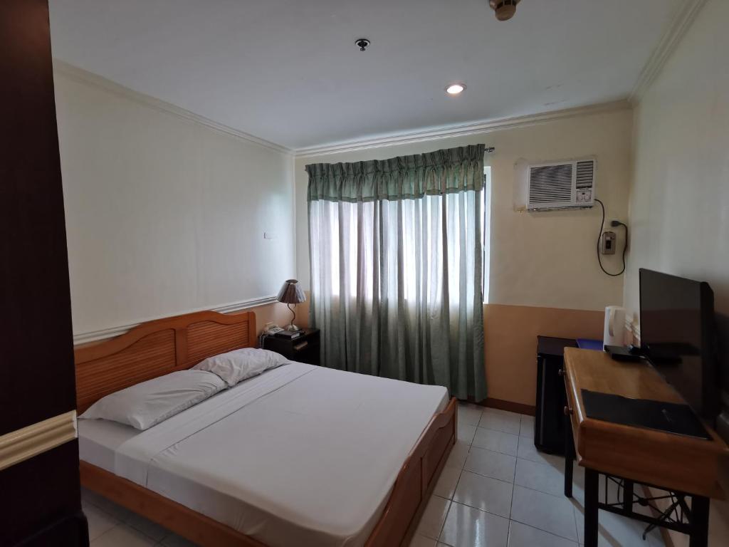 Двухместный (Стандартный двухместный номер с 1 кроватью) отеля Metro Park Hotel - Cebu City, Себу