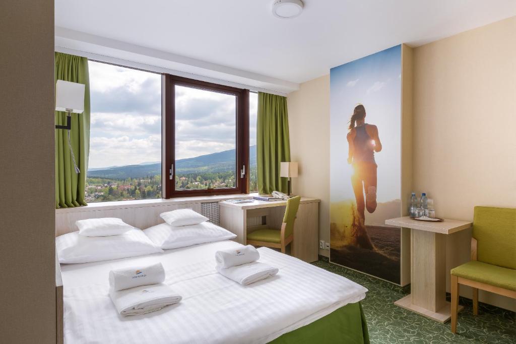 Двухместный (Небольшой двухместный номер с 1 кроватью) отеля Interferie Sport Hotel Bornit, Шклярска-Поремба