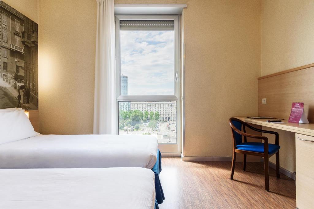 Двухместный (Двухместный номер с 2 отдельными кроватями) отеля Hotel Aosta - Gruppo MiniHotel, Милан
