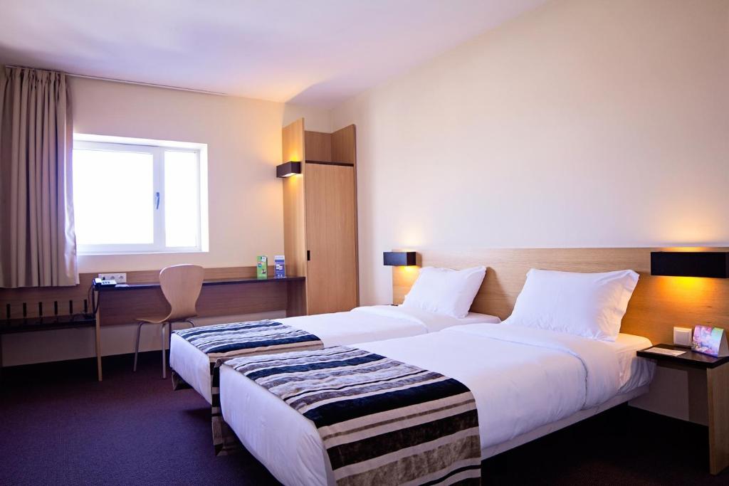 Двухместный (Стандартный двухместный номер с 2 отдельными кроватями) отеля Park Hotel Porto Aeroporto, Майя