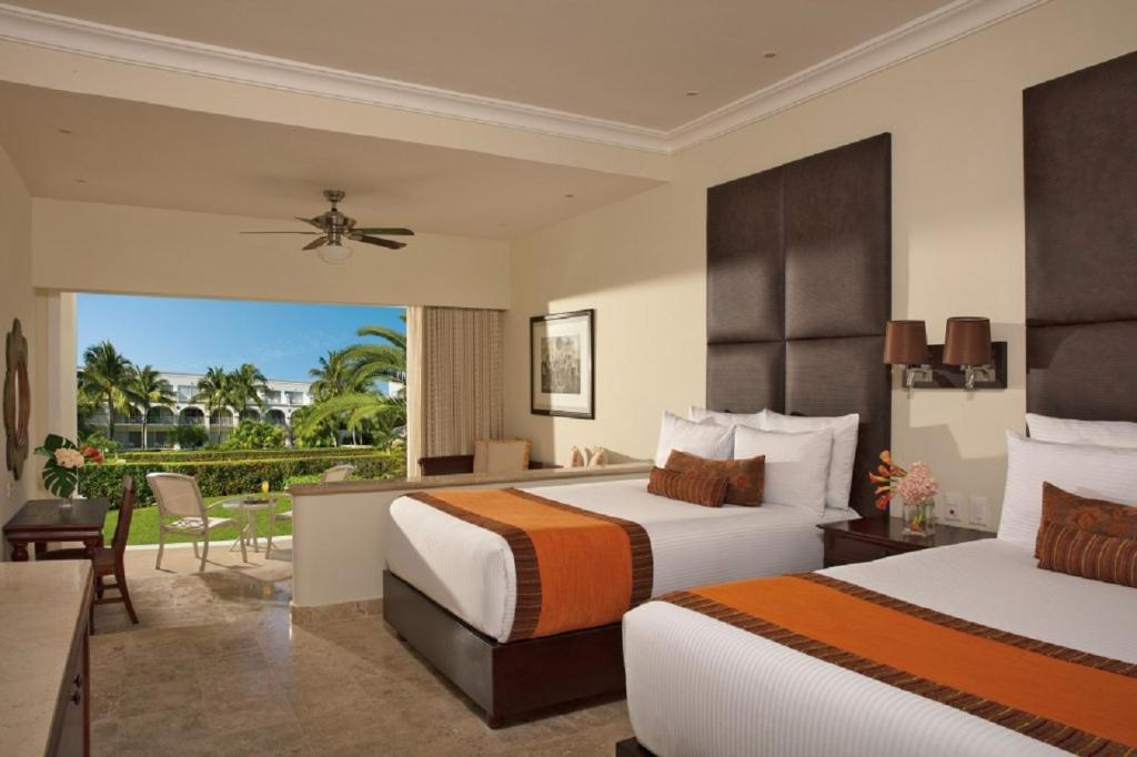 Сьюит (Двухместный полулюкс с 1 кроватью, видом на сад и завтраком) курортного отеля Dreams Tulum Resort & Spa - All Inclusive, Тулум