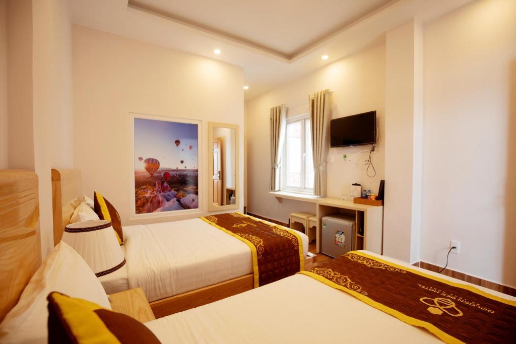 Семейный (Улучшенный семейный номер) отеля Golden Bee Hotel, Далат
