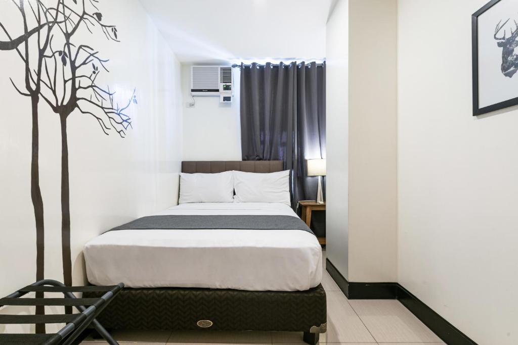 Двухместный (Superior 1-Bedroom) отеля Artemis Place Makati Hotel, Манила