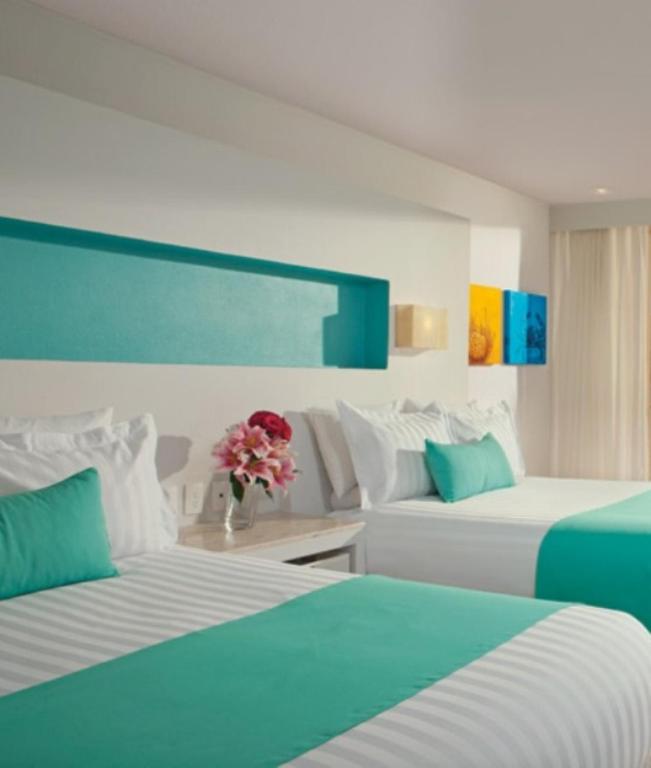 Двухместный (Двухместный номер Делюкс с 1 кроватью и частичным видом на океан, план питания с завтраком) курортного отеля Sunscape Dorado Pacifico Ixtapa Resort & Spa - Все включено, Икстапа