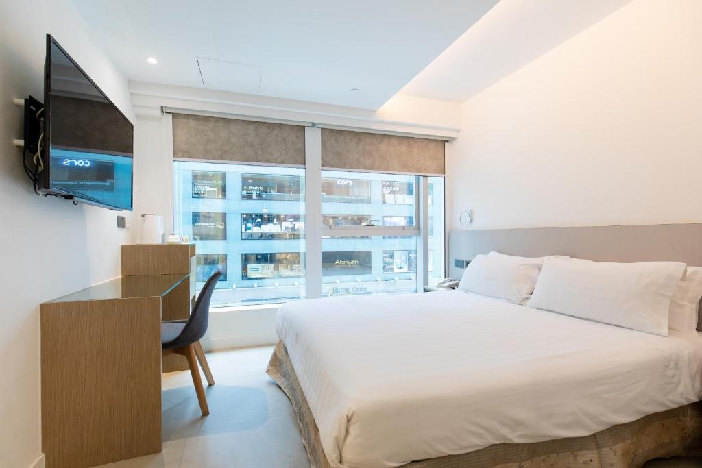 Двухместный (Улучшенный двухместный номер с 1 кроватью) отеля Wifi Boutique Hotel, Гонконг (город)