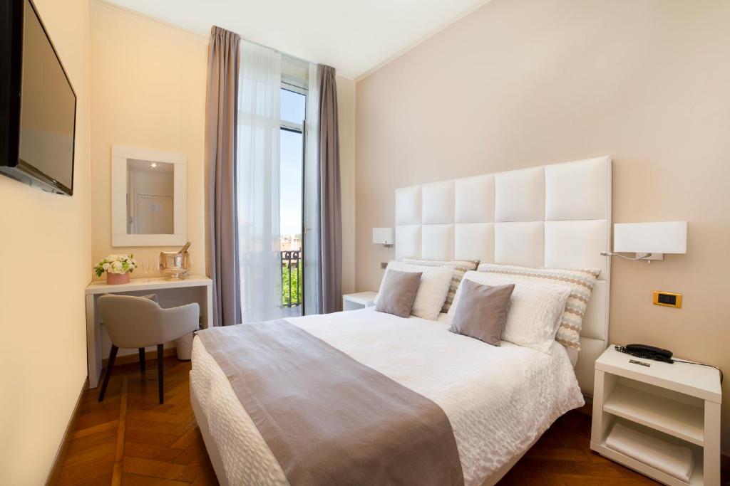 Двухместный (Стандартный двухместный номер с 1 кроватью или 2 отдельными кроватями) отеля Hotel Villa Elisa & Spa, Бордигера