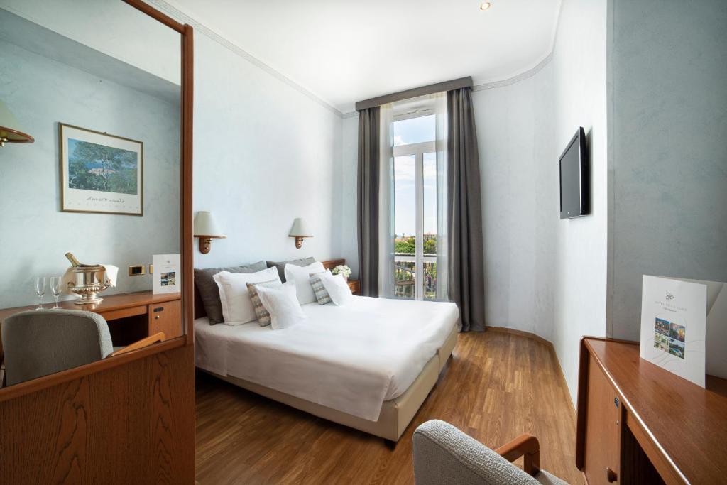 Двухместный (Двухместный номер «Комфорт» с 1 кроватью или 2 отдельными кроватями) отеля Hotel Villa Elisa & Spa, Бордигера