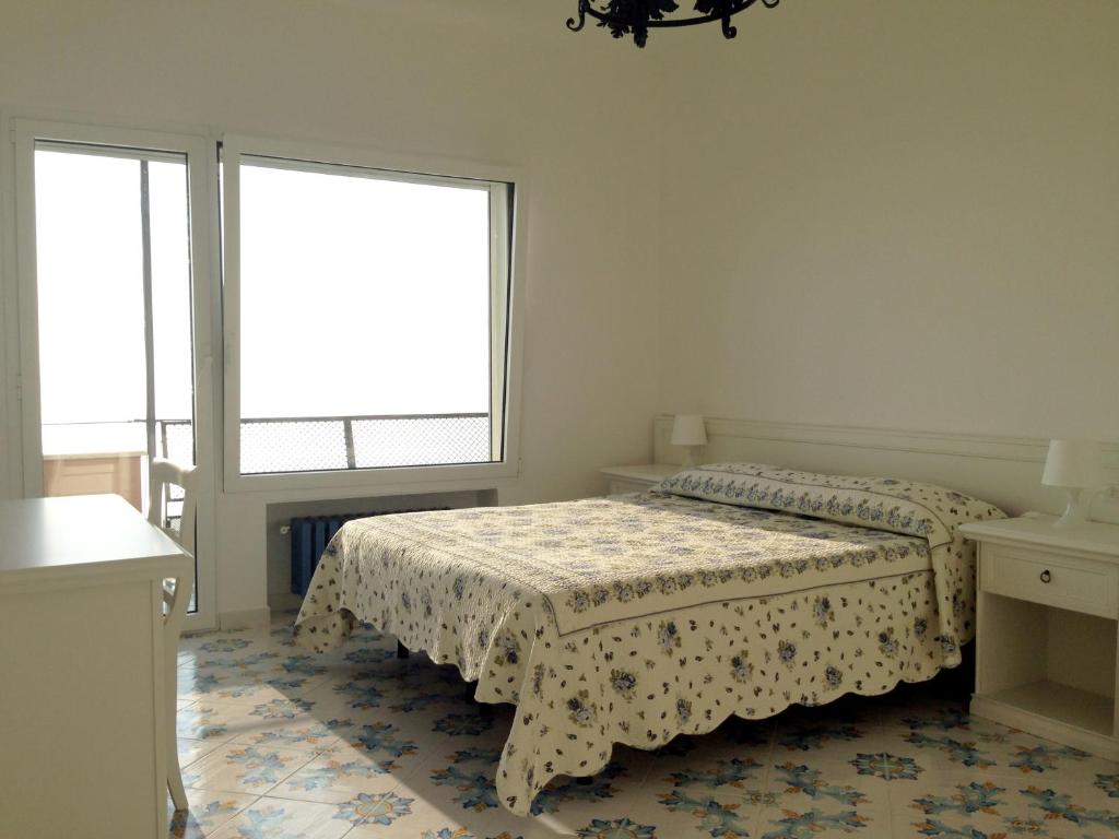 Двухместный (Двухместный номер с 1 кроватью или 2 отдельными кроватями и собственной внешней ванной комнатой) отеля B&B Dipintodiblu', Неаполь