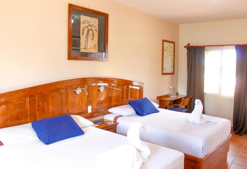 Двухместный (Стандартный двухместный номер с 1 кроватью или 2 отдельными кроватями) отеля Hotel Angra, Лорето