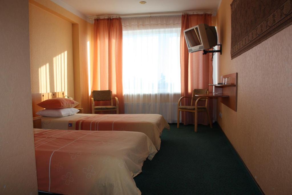 Двухместный (Двухместный номер с 2 отдельными кроватями), Hotel Madona