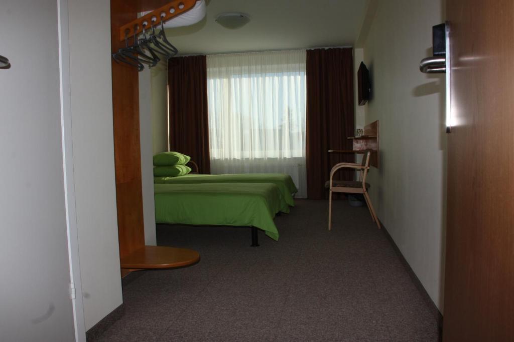 Двухместный (Классический двухместный номер с 2 отдельными кроватями) отеля Hotel Madona, Мадона