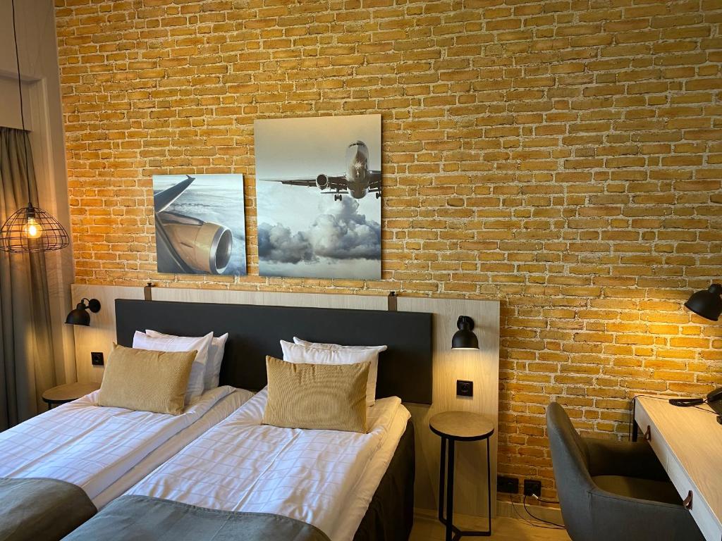 Двухместный (Стандартный двухместный номер с 2 отдельными кроватями и мини-кухней) отеля Airport Hotel Bonus Inn, Вантаа