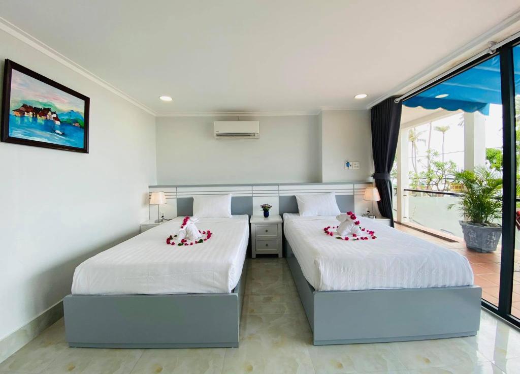 Двухместный (Двухместный номер Делюкс с 1 кроватью или 2 отдельными кроватями и видом на море) отеля Vivian Hotel Mui Ne, Фантхьет