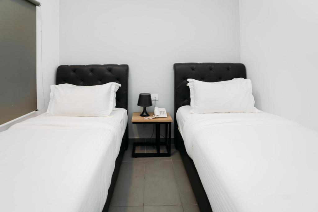 Двухместный (Двухместный номер Делюкс с 2 отдельными кроватями) отеля B Lot Hotel, Куала-Лумпур