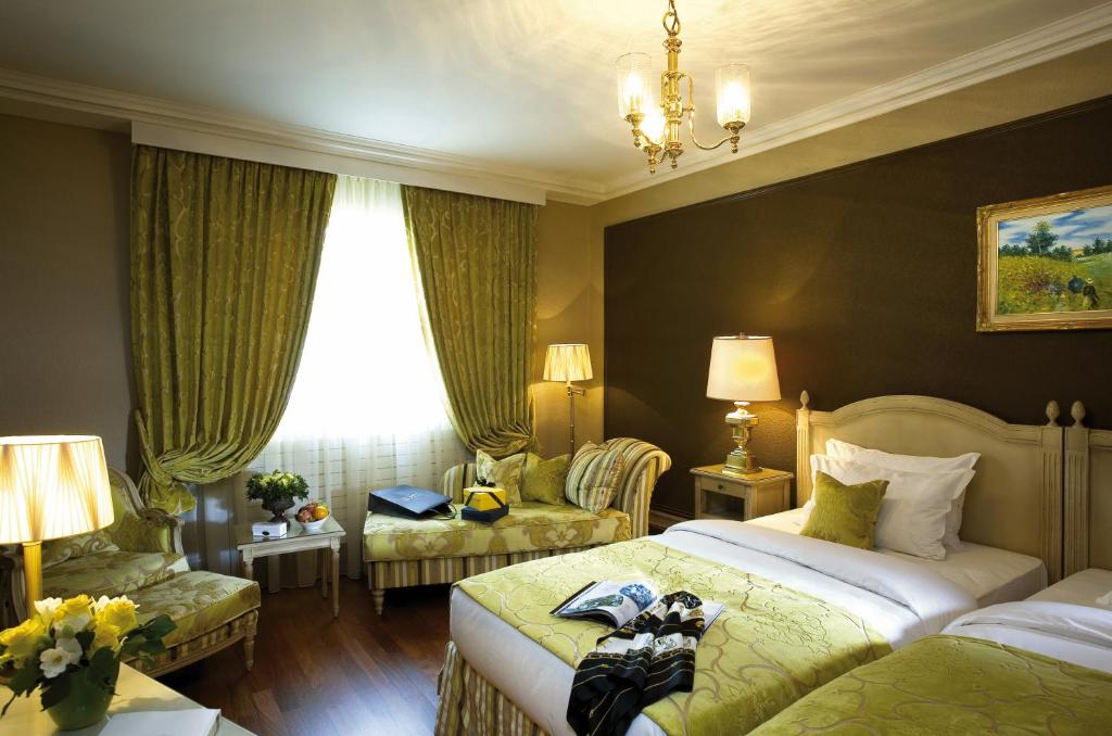 Двухместный (Классический двухместный номер с 2 отдельными кроватями) отеля Hôtel de la Cigogne, Женева