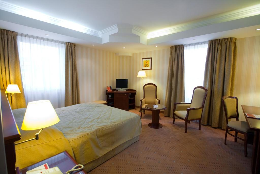 Двухместный (Номер бизнес-класса с 1 кроватью размера «king-size» - Для некурящих) отеля Ramada Hotel & Suites Bucharest North, Бухарест