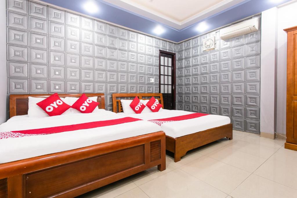 Четырехместный (Улучшенный четырехместный номер) отеля Honey Hotel, Дананг