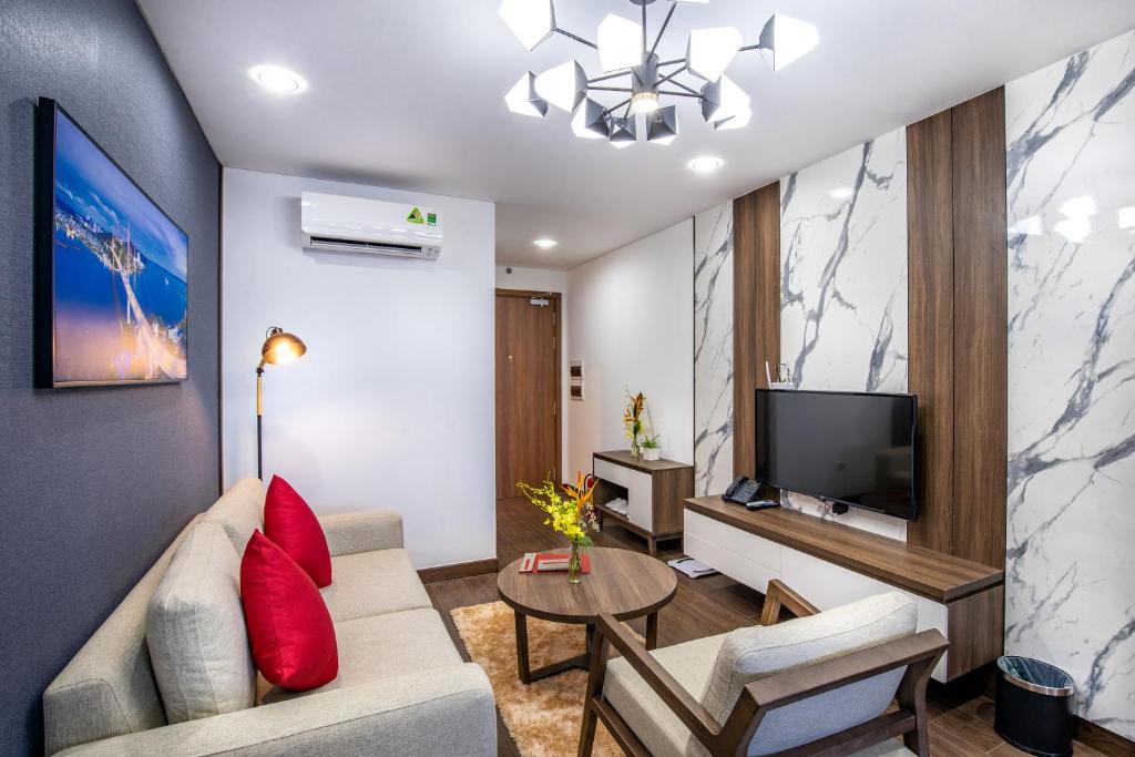 Апартаменты (Deluxe Double 2-bedrooms) апарт-отеля Ramada Hotel & Suites by Wyndham Halong Bay View, Халонг