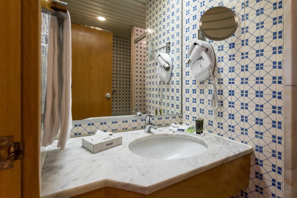 Двухместный (Стандартный двухместный номер с 1 кроватью или 2 отдельными кроватями) отеля Hotel Estoril Eden, Эшторил