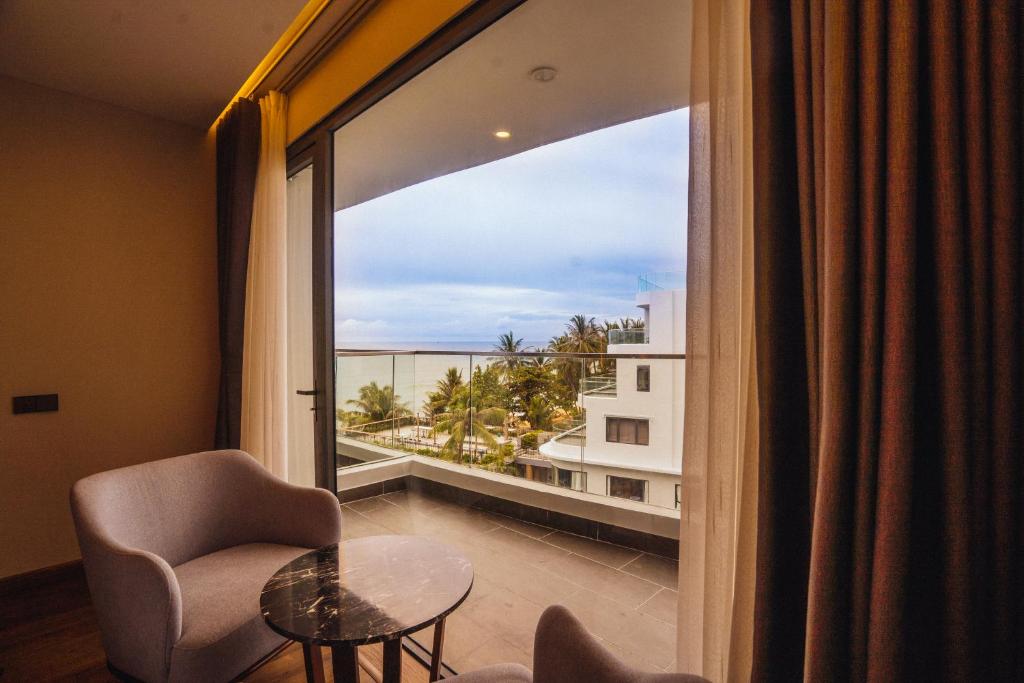 Двухместный (Двухместный номер Делюкс с 2 отдельными кроватями и видом на океан) отеля Sunset Beach Resort and Spa, Дуонг-Донг