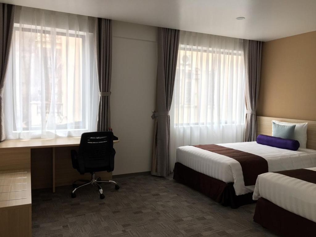Двухместный (Двухместный номер Делюкс с 1 кроватью или 2 отдельными кроватями) отеля HOTEL 1-2-3 HANOI Linh Lang, Ханой