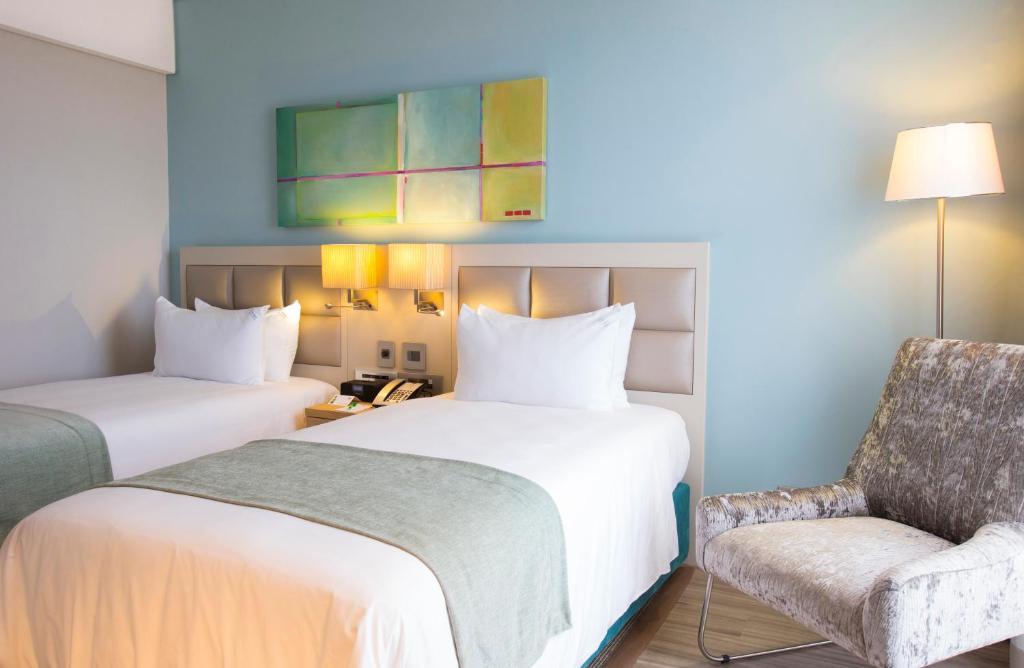 Двухместный (Стандартный двухместный номер с 2 отдельными кроватями — Для некурящих) отеля Holiday Inn Mauritius Mon Trésor, Блу-Бей