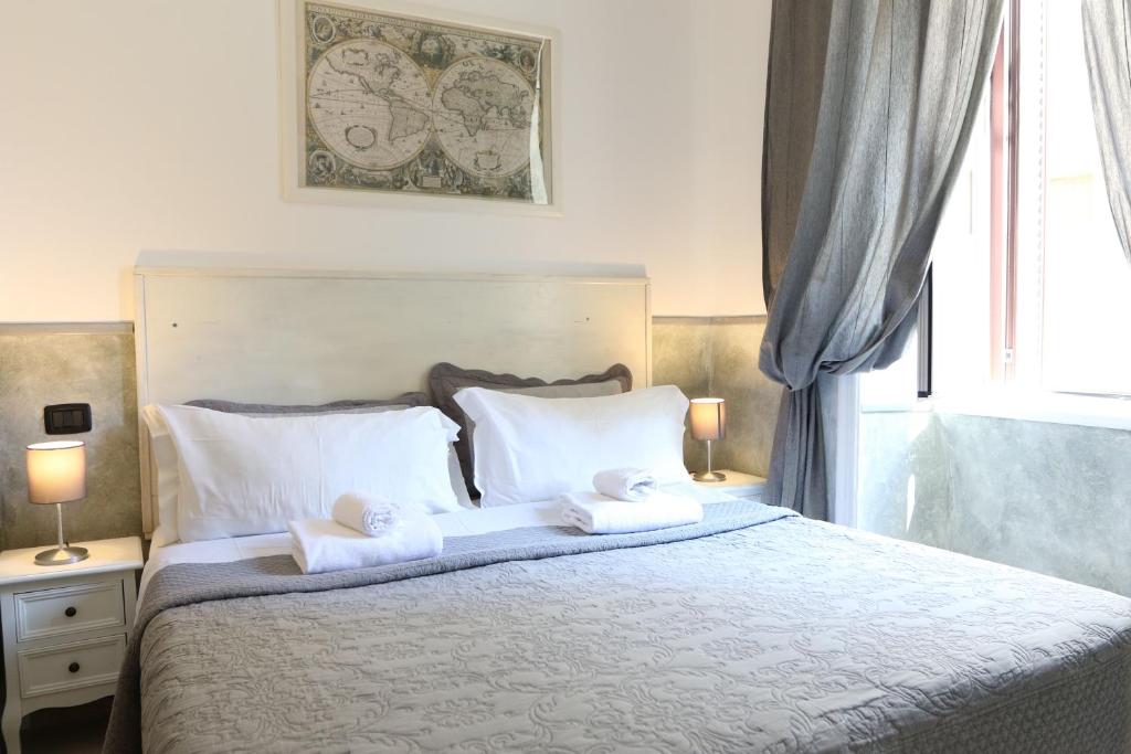 Двухместный (Небольшой двухместный номер с 1 кроватью или 2 отдельными кроватями и собственной ванной комнатой) гостевого дома Relais Independenza, Рим