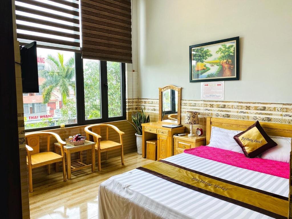 Двухместный (Двухместный номер Делюкс с 1 кроватью и ванной) отеля Hotel Phi Hùng, Тамки