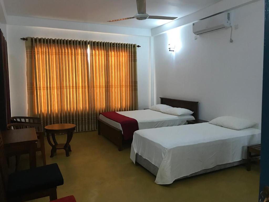 Трехместный (Бюджетный трехместный номер) семейного отеля Villa Whispering Shells, Калутара