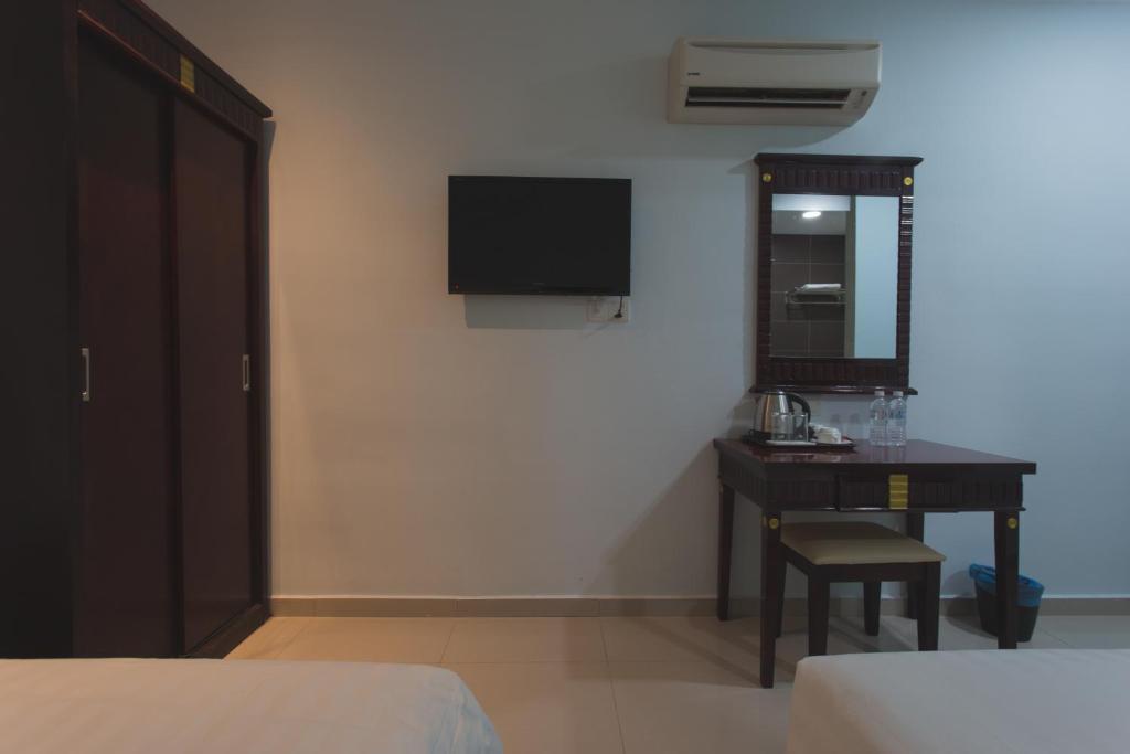 Двухместный (Улучшенный двухместный номер с 2 отдельными кроватями без окон) отеля W Hotel @ Masjid Jamek, Куала-Лумпур